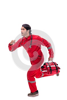 The young paramedic in red uniform isolated on white