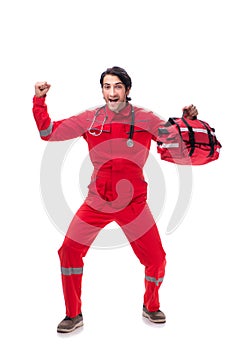 The young paramedic in red uniform isolated on white