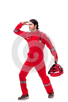 The young paramedic in red uniform isolated on white