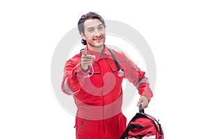 The young paramedic in red uniform isolated on white