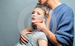 Young passionate couple. Fashion studio photo of beautiful sensual couple posing together.