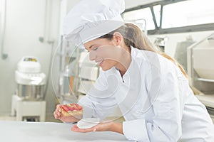 Young pastrycook at work