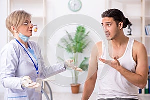 Young patient visiting doctor in hospital