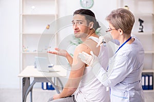 Young patient visiting doctor in hospital