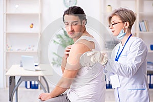 Young patient visiting doctor in hospital