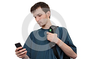 A young pensive man with smartphone