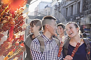 Young people buying candied haw.