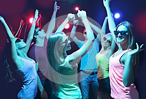 Young people dancing in a nightclub