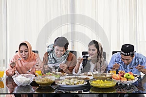 Young people eat during Eid Mubarak celebration
