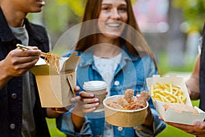 Young people eating fast food