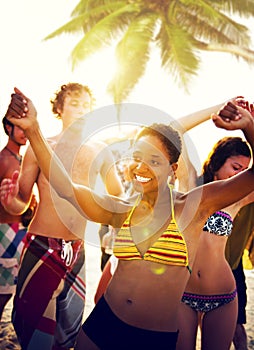 Young People Enjoying a Summer Beach Party