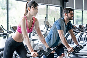 Young people exercise in the gym