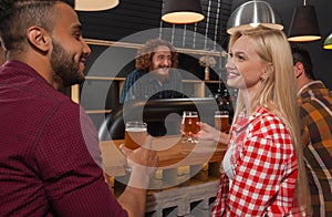 Young People Group In Bar, Couple Sitting At Wooden Counter Pub, Drink Beer