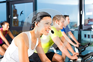 Young People Spinning in the gym