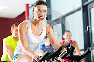 Young People Spinning in the gym