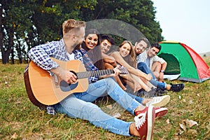 Young people have fun at the weekend in nature.