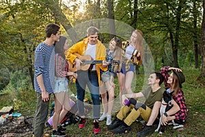 Young people having outdoors party