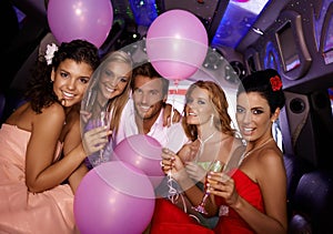 Young people having party in limo