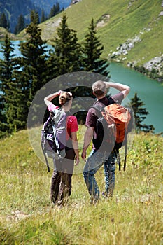 Young people hiking in the mountains