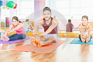 Young people lead a healthy lifestyle, exercise in fitness room