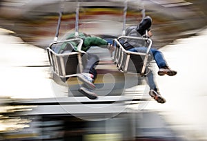 Young people on Merry Go Round at Lunapark photo
