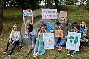 Young people with placards and posters on global strike for climate change