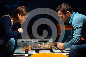 Young people playing chess