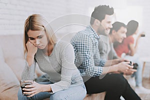 Young People Playing Videogames on Party at Home.