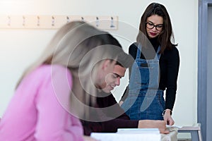 Young people in programming school.Students Learning In A Programing Class