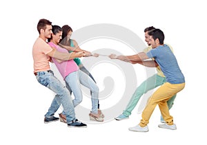 Young people pulling a rope