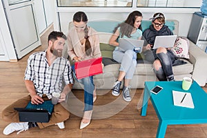 young people sharing a collaborative office space in a modern hu