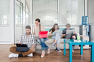 young people sharing a collaborative office space in a modern hu