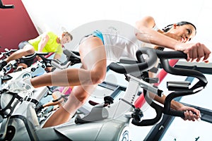 Young People Spinning in the fitness gym