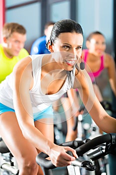 Young People Spinning in the fitness gym