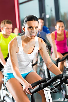 Young People Spinning in the gym