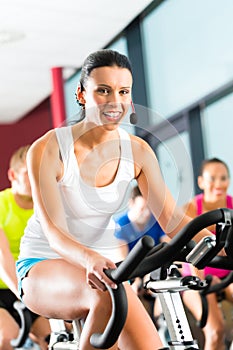 Young People Spinning in the gym