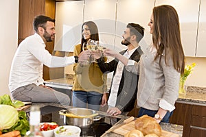 Young people toasting with white wine