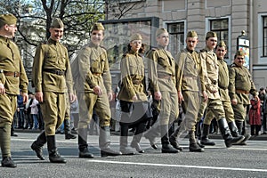 Young people in the uniform of the Second World War.