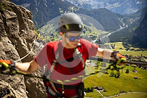 Young people on a via ferrata route photo