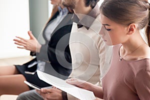 Young people waiting for job interview, audition or training ind photo