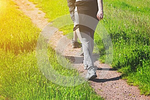 Young people walking along a rural farm track