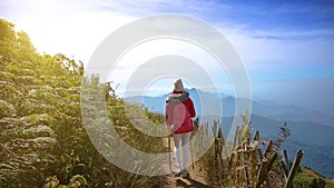 Young people walking on a hilltop in Doi Inthanon, Chiang Mai, Thailand