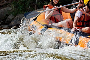 Young person rafting on the river