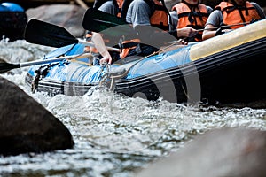 Young person rafting on the river