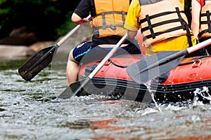 Young person rafting on the river