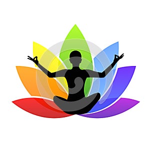 Young person sitting in yoga meditation lotus position silhouette with colorful lily in rainbow colors