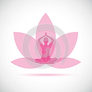 Young person sitting in yoga meditation lotus position silhouette with pink lily