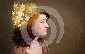 Young person thinking with glowing puzzle mind