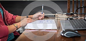 A young person working remotely in a home office