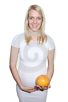 Young Petty Natual Beauty Pregnant Woman Holding Grapefruit and Shows a Belly That Begins to Grow Isolated on White Background. 20